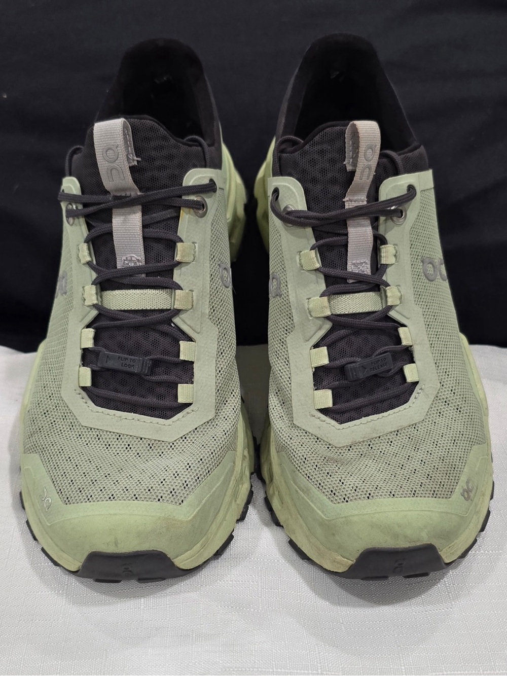 On Running Women’s Green and Black Trail Running Shoes